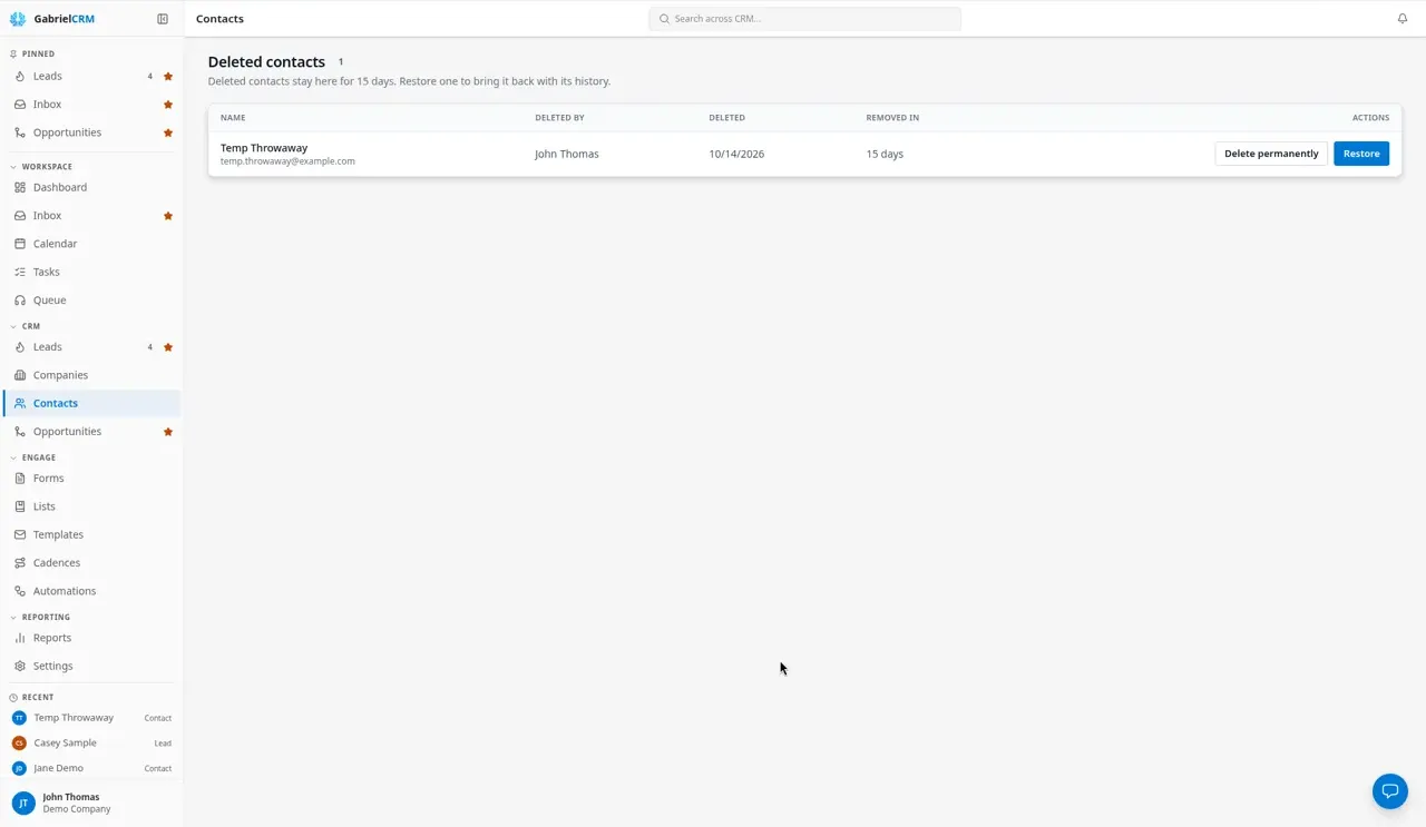 The Deleted contacts list with a deleted contact and its Restore button.