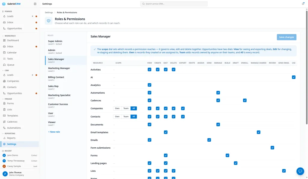 The Roles & Permissions page with a role selected and its permissions grid.