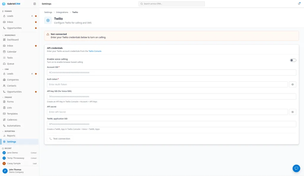 The Twilio settings page before it is connected, showing the API credentials form.
